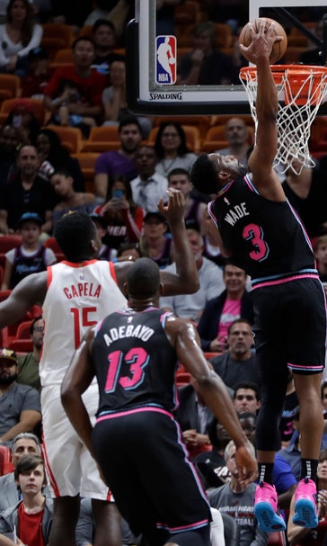 Rockets lose Paul, Heat escape with 101-99 victory
